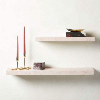 two burl wood floating shelves with decor